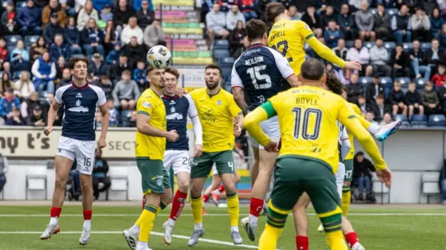 Hibs' Josh Campbell rises to score