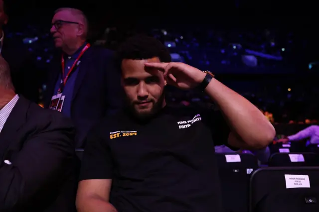 Moses Itauma salutes the camera