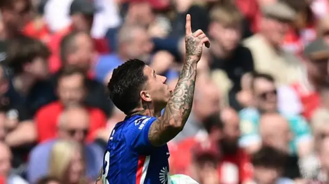 Enzo Fernandez of Chelsea celebrates scoring a goal to make the score 1-1 during the Premier League match between Liverpool and Chelsea