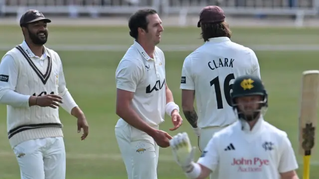 Surrey's Dan Worrall is congratulated after dismissing Ben Duckett of Nottinghamshire