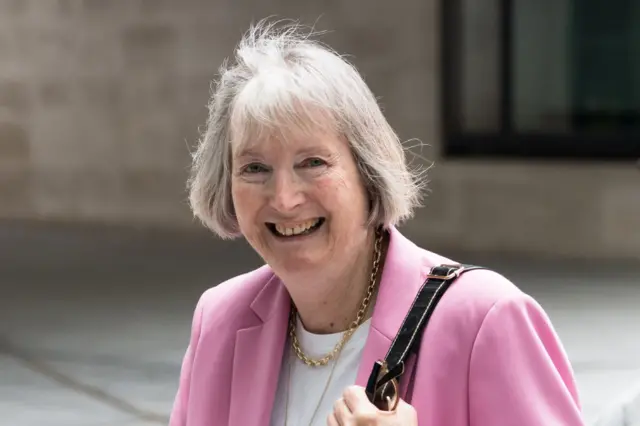 Labour veteran Harriet Harman arrives at the BBC's Broadcasting House in 2024, wearing pink suit