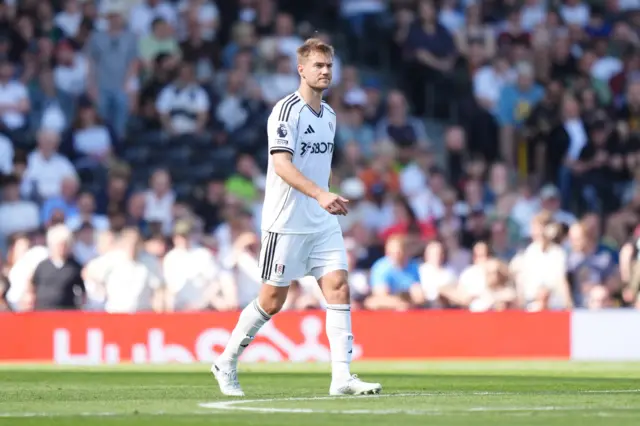 Fulham’s Joachim Andersen leaves the field after being shown a red card