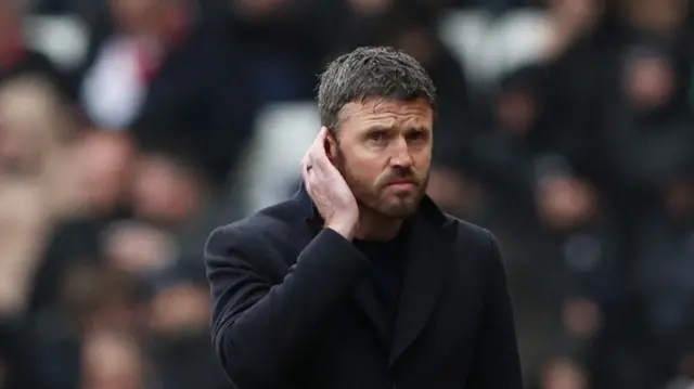 Manchester United manager Michael Carrick reacts