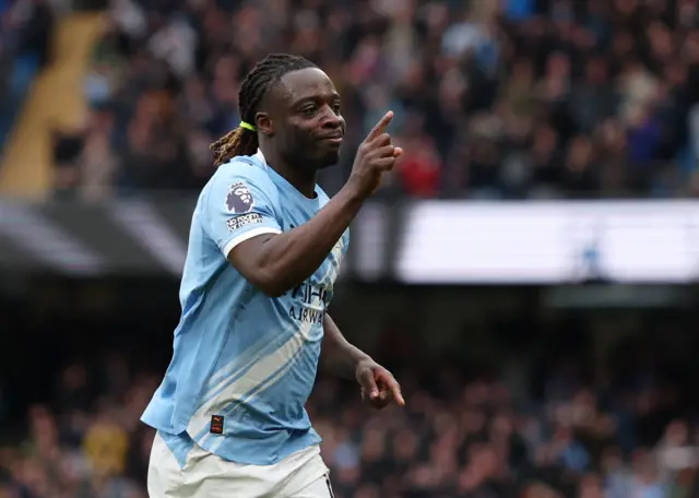 Manchester City's Jeremy Doku celebrates scoring their first goal