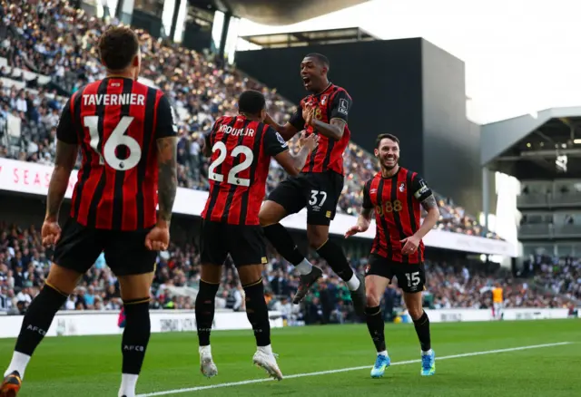 AFC Bournemouth's Rayan Rocha celebrates scoring their first goal with Eli Junior Kroupi and Adam Smith