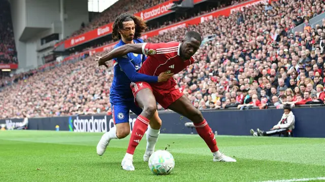 Marc Cucurella vies with Ibrahima Konate