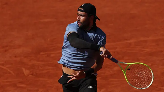 Matteo Berrettini hits a forehand