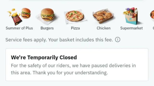 Deliveroo app home screen with selections of food. Below the search bar it says: "We're Temporarily Closed. For the safety of our riders, we have paused deliveries in this area. Thank you for understanding."