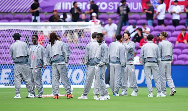 Marc Guehi of England inspects the pitch