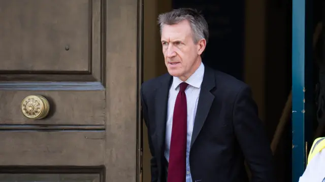 Dan Jarvis looks to the left of the camera as he exits the Cabinet Office