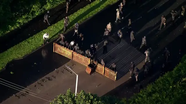 Aerial view of group using barricade