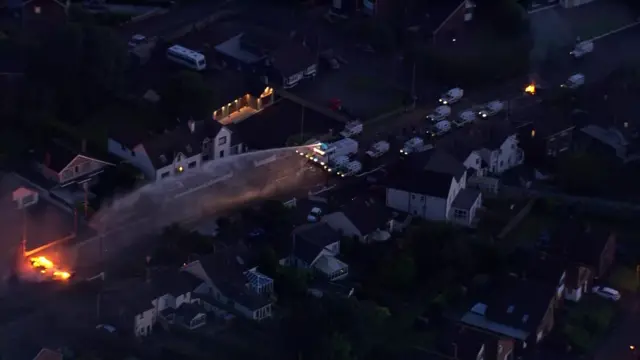 Aerial footage showing police and protestors