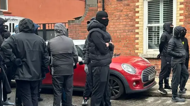 Masked men in Belfast street