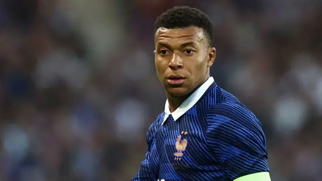 Kylian Mbappe playing for France