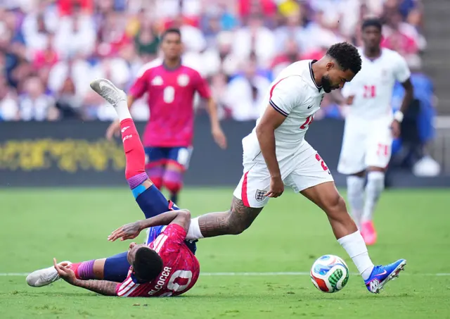 Josimar Alcocer is fouled by Reece James