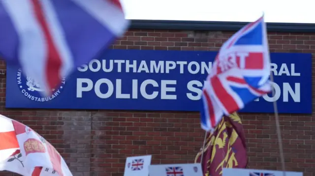 Union Jack flags can be seen flying in front of Southampton Police Station on the day of the protest on 2 June