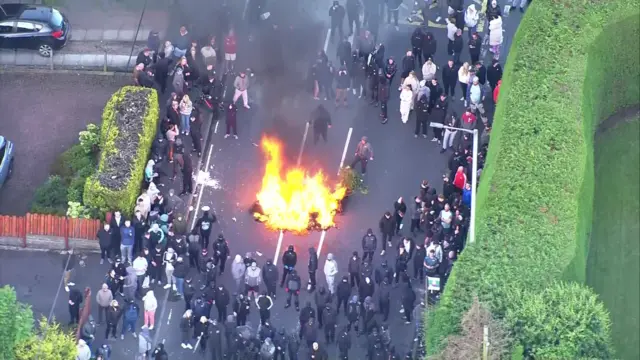 Aerial footage showing police and protesters