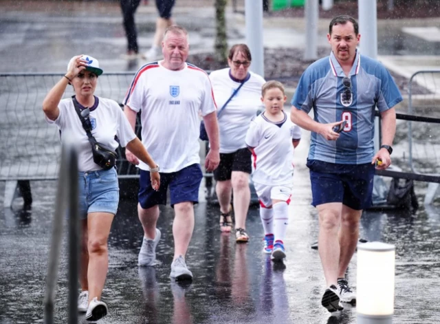 An England fan in the rain