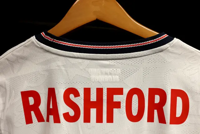 A detailed view of the shirt of Marcus Rashford on display
