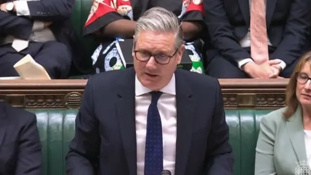 Keir Starmer, wearing a suit, speaking in Parliament.