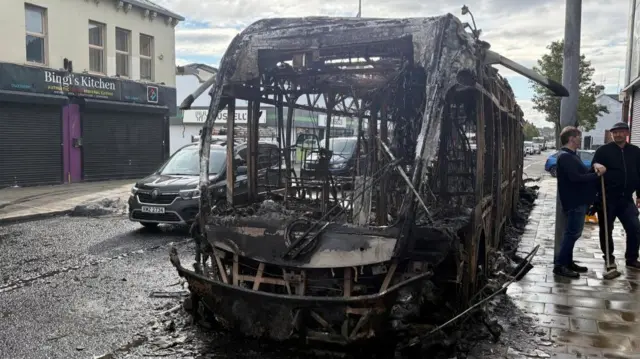 A destroyed Glider bus seen on Newtownards Road in east Belfast on Wednesday morning