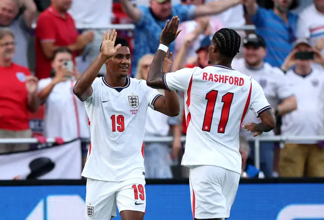 Ollie Watkins celebrates with teammate Marcus Rashford