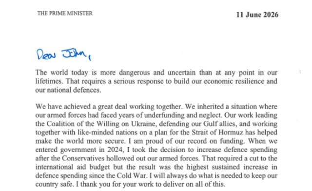 A part of the letter sent from Starmer to John Healey, with handwritten words "Dear John" at the top in blue ink.