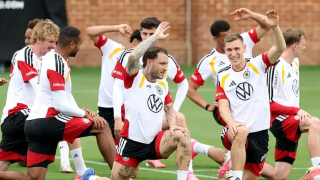 David Raum of Team Germany warms up with team mate Nico Schlotterbeck during a training session at W. Dennie Spry Soccer Stadium on June 10, 2026 in Winston-Salem, North Carolina
