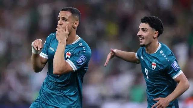 Ali Al-Hamadi (L) celebrates scoring his team's first goal during the 2026 FIFA World Cup qualifiers final playoff football match between Iraq and Bolivia at the BBVA Stadium in Guadalupe, Nuevo Leon state, Mexico, on March 31, 2026.