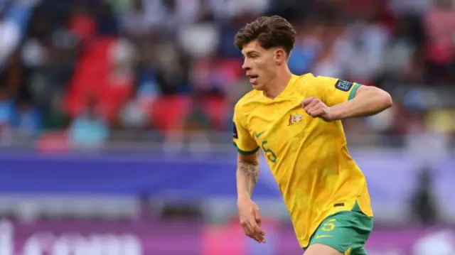 Jordy Bos of Australia runs with the ball during the AFC Asian Cup Group B match between Australia and India at Ahmad Bin Ali Stadium on January 13, 2024 in Doha, Qatar.