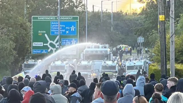 A water cannon deployed against a crowd in Northern Ireland.