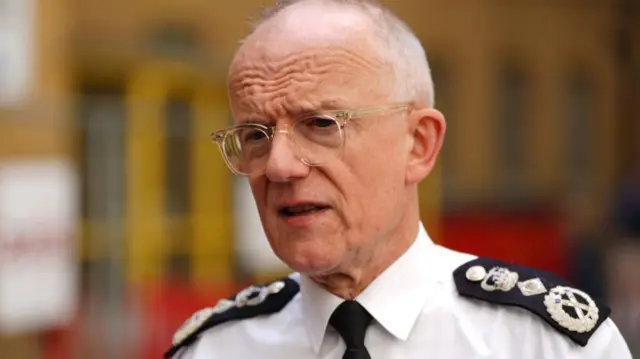 Sir Mark Rowley is pictured speaking, while wearing his police uniform.