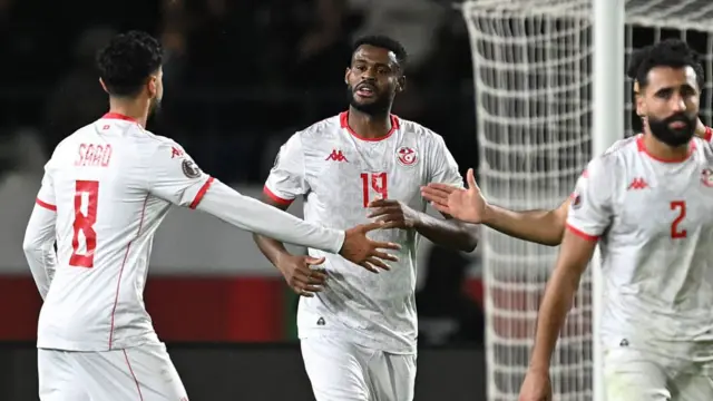 Tunisia's forward #19 Firas Chaouat (C) celebrates scoring his team's first goal during the Africa Cup of Nations (CAN) round of 16 football match between Mali and Tunisia at Mohammed V Stadium in Casablanca on January 3, 2026