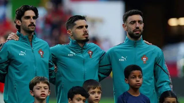 Portugal players line up with mascots