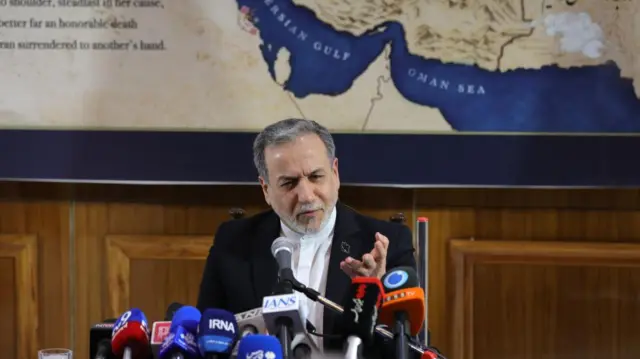 Abbas Araghchi giving a press conference