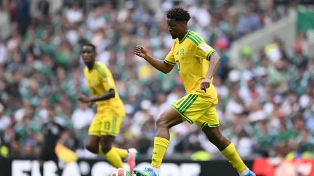 Ime Okon #21 of South Africa controls the ball during the FIFA World Cup 2026 Group A match between Mexico and South Africa at Mexico City Stadium on June 11, 2026 in Mexico City, Mexico