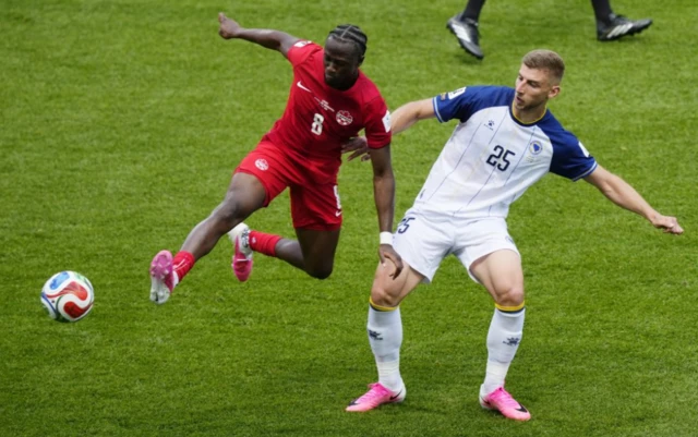Canada's Ismael Kone in action with Bosnia and Herzegovina's Jovo Lukic
