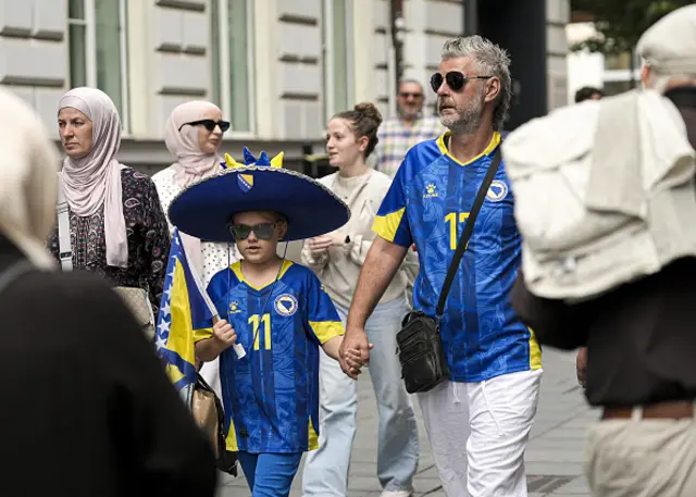 People gather on the streets with excitement ahead of the countryâs opening match against Canada