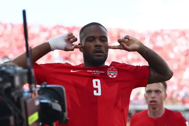 Cyle Larin celebrates