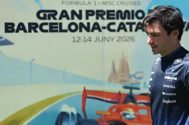 Carlos Sainz arrives in the Barcelona paddock