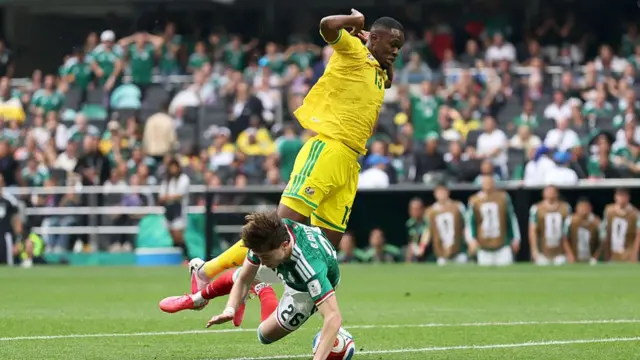Brian Gutierrez #26 of Mexico is fouled by Sphephelo Sithole #13 of South Africa during the FIFA World Cup 2026 Group A match between Mexico and South Africa at Mexico City Stadium on June 11, 2026 in Mexico City, Mexico.