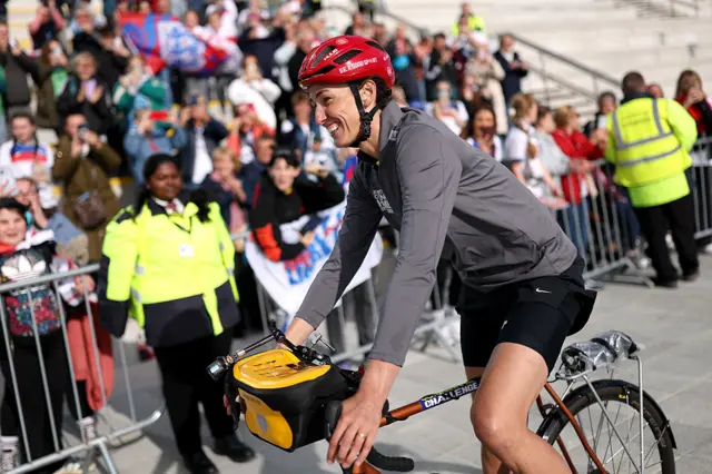 Jill Scott arrives on her bike at Hill Dickinson Stadium