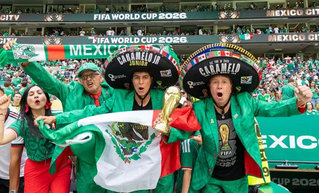 Mexico supporters wearing Sombrero's celebrate