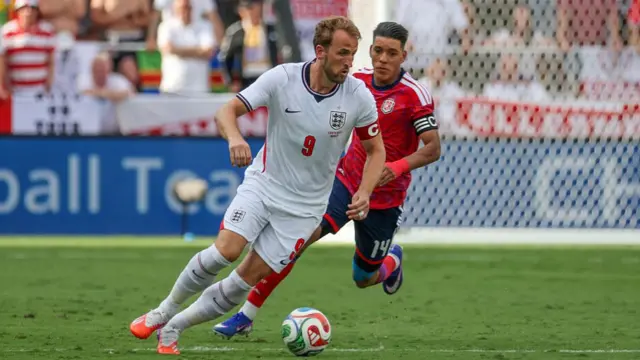 Harry Kane #9 of England runs past Orlando Galo #14 of Costa Rica during an International Friendly match at Inter&Co Stadium on June 10, 2026 in Orlando, Florida.