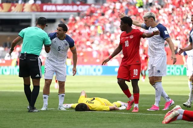 Sead Kolasinac #5 of Bosnia and Herzegovina and Jonathan David