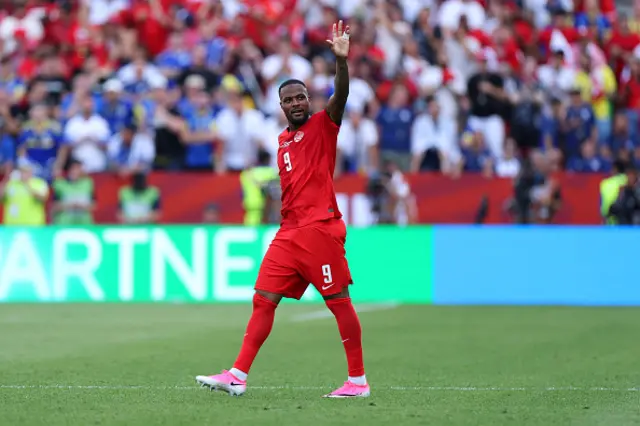 Cyle Larin of Canada celebrates