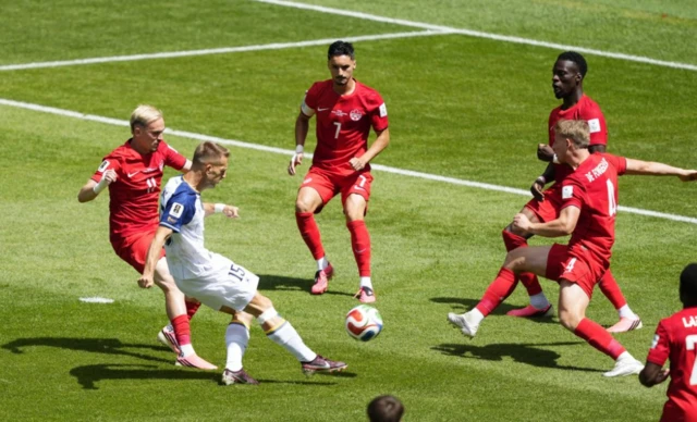 Bosnia and Herzegovina's Amar Memic shoots