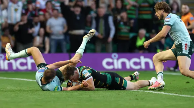 Archie McParland scores a try