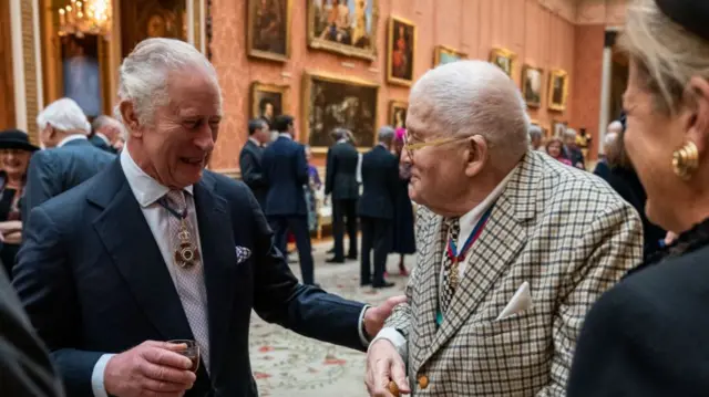King Charles III talks with Mr David Hockney
