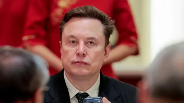 A close-up photo of Elon Musk.